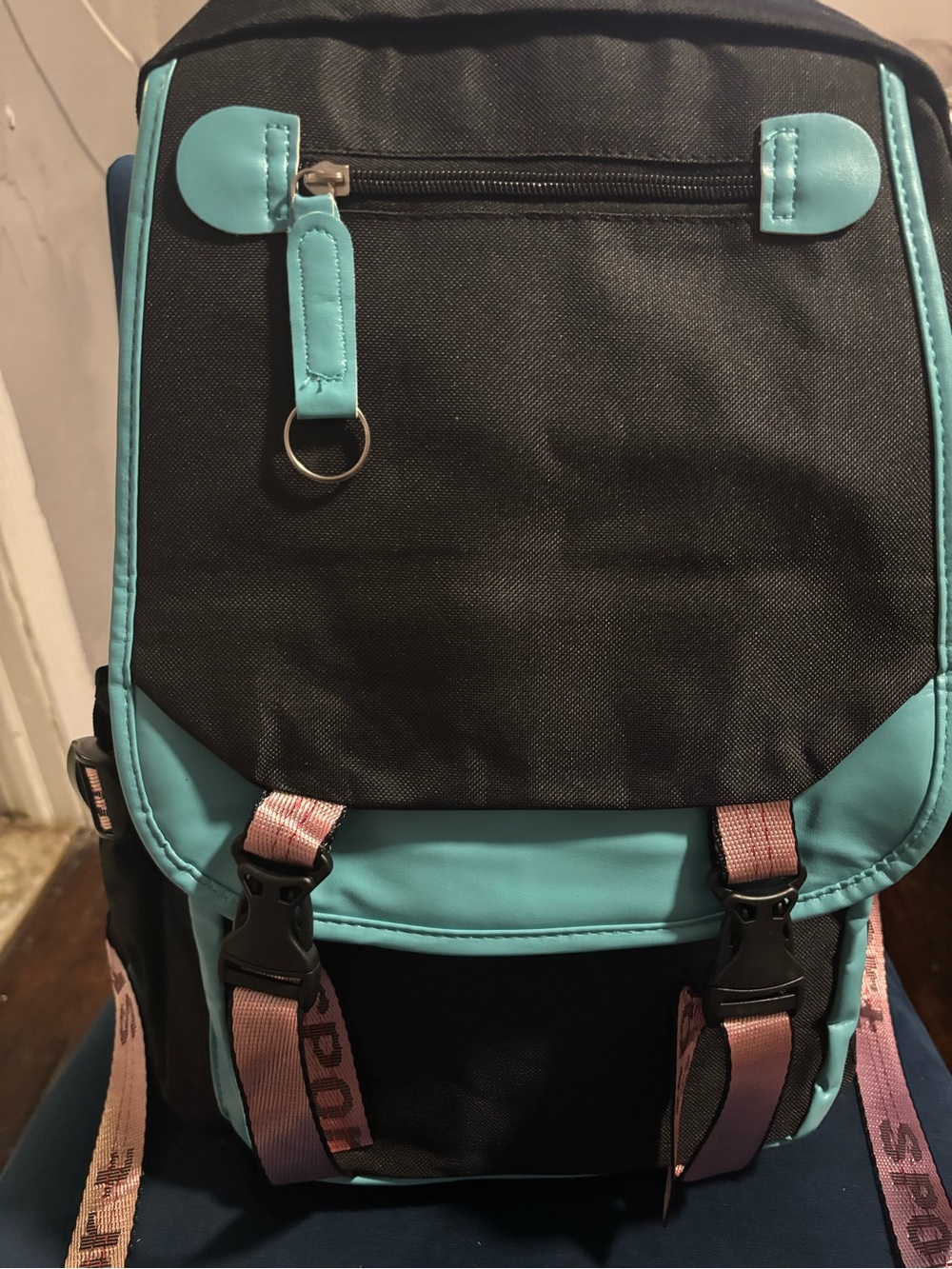 Black and Teal Women's Backpack with Pink Accent Straps